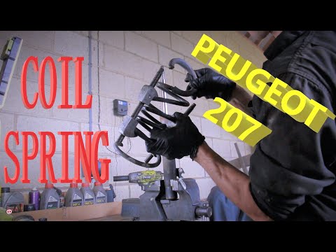 Видео: КАК: замена/замена пружины передней подвески, PEUGEOT 207