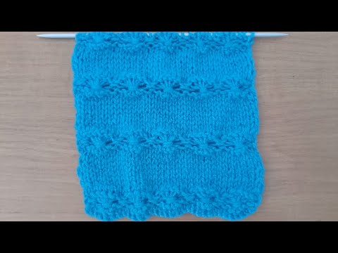 Видео: Узор "Ажурные цветы" на спицах #93