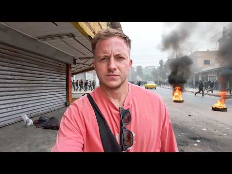 Видео: Нападение и арест во время смертоносных протестов в Камеруне 🇨🇲