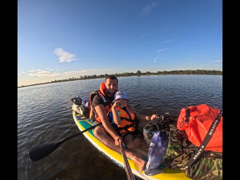 Видео: Спуск с сыном на сапе по Волге