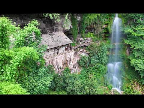 Видео: В Юньнани обнаружены пещерные дома, окружающая среда очень красива.
