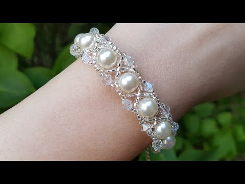 Видео: Браслет из бусин и бисера/Браслет из бисера/Браслет из биконусов/Beaded Bracelet/Beaded Bicone brace