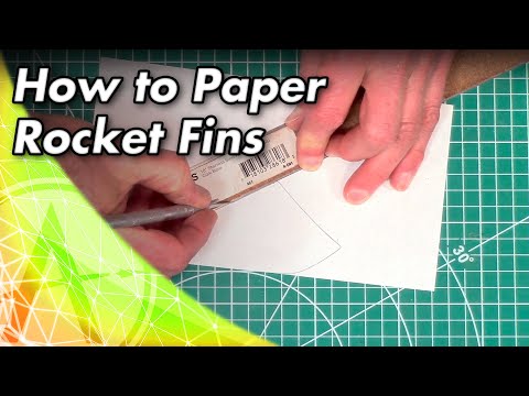 Видео: Как оклеить бумагой стабилизаторы модели ракеты для дополнительной прочности