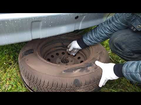 Видео: Как снять запасное колесо на OUTLANDER XL