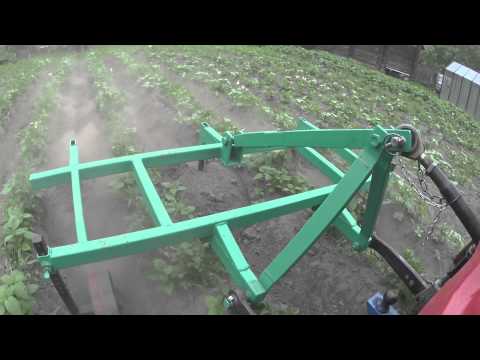 Видео: Мтз 320 окучивание картофеля