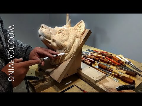 Видео: Wood carving Wolf. Резьба по дереву