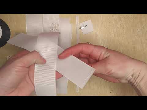 Видео: Галстук для девочки в школу.