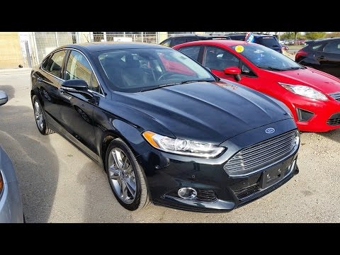 Видео: Обзор Ford Fusion Titanium 2014/2015, запуск и осмотр