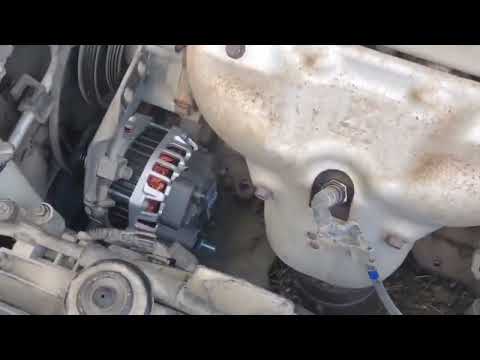 Видео: Замена генератора | Kia Spectra 2004-2009