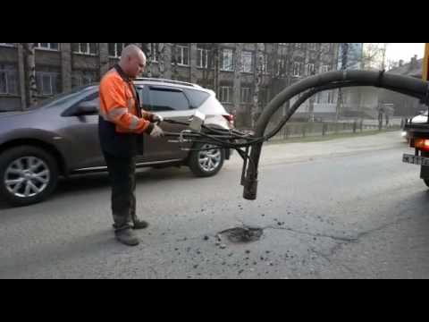 Видео: 2016 05 06 2Ямочный ремонт дорожного покрытия струйно-инъекционным способом (Компания Архкомхоз)067