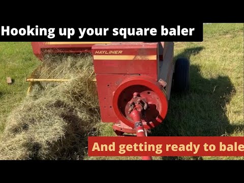 Видео: Подключаем тюковый пресс-подборщик и готовимся к тюкованию
