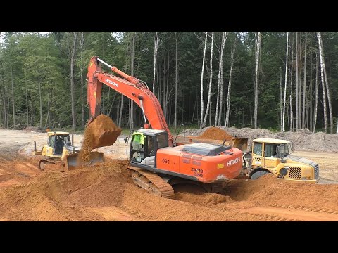 Видео: Экскаватор Hitachi Zaxis 330LC-5G грузит думпера Volvo A30D часть 1