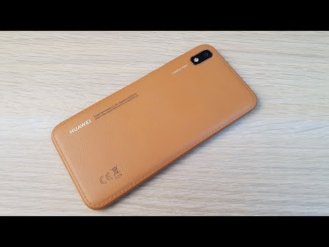 Видео: HUAWEI Y5 2019 - СМАРТФОН ИЗ "КОЖИ" ЗА 7990 РУБЛЕЙ!