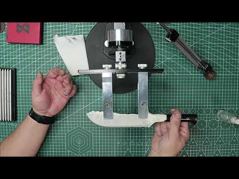 Видео: Ножи от компании Уран Система мастер Ураков. Заточка в линзу.