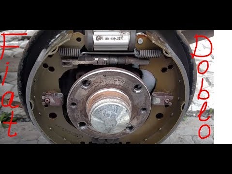 Видео: Замена задних тормозных колодок Fiat Doblo 2008