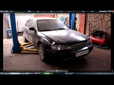 Видео: Установка радиатора охлаждения на Kia Clarus 2,0 Киа Кларус 1996 года