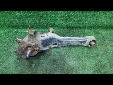 Видео: Тот самый задний продольный рычаг Mitsubishi Carisma лифтбек
