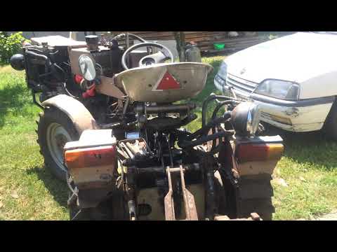 Видео: Трактор мини TZ4K14 1.9D гидравлика трактора рулевое управление обзор.