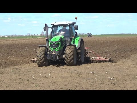 Видео: Весенняя культивация: Трактора Deutz-Fahr 6205G, МТЗ 1221 и 1222 с КШП-6 готовят почву под посев