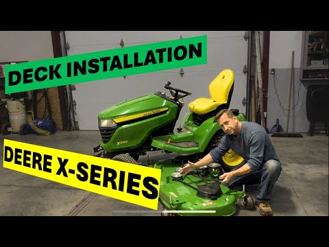 Видео: Установка деки косилки Deere X590