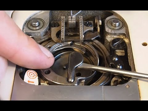 Видео: Singer 700 Series — позиционирование шпульного колпачка