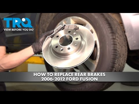 Видео: Как заменить задние тормоза Ford Fusion 2006-2012