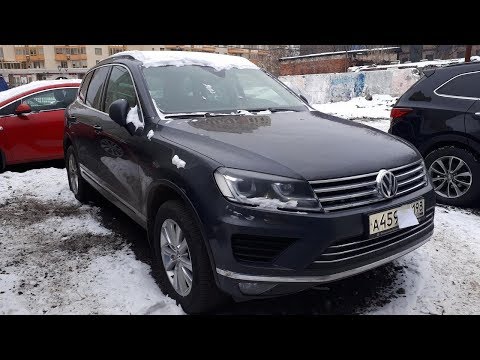 Видео: Volkswagen Touareg 2014. Как открыть дверь. Сел аккумулятор. Замена аккумулятора.