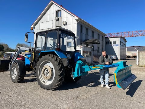Видео: Обзор грейдерного поворотного отвала на МТЗ