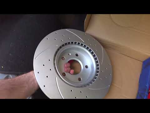 Видео: Замена передних тормозных дисков Ford Modeo 5