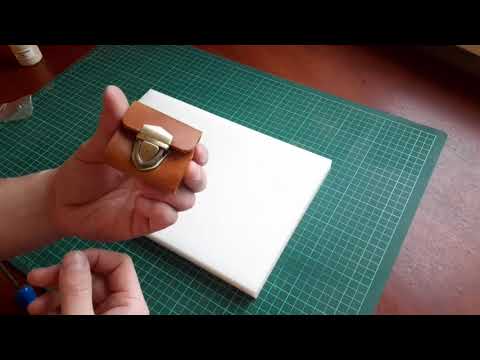 Видео: Установка замка для сумки. Портфельный замок