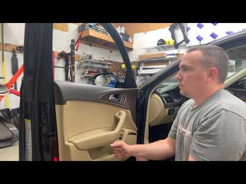 Видео: Как снять: переднюю дверную панель Audi A6 2014 года