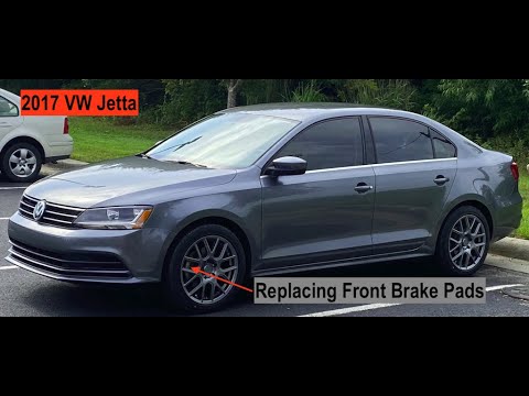 Видео: VW Jetta 2017: замена передних тормозных колодок