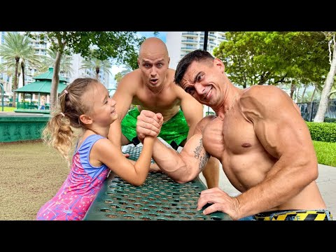 Видео: Девушка-гимнастка бросила вызов бодибилдерам в армрестлинге!