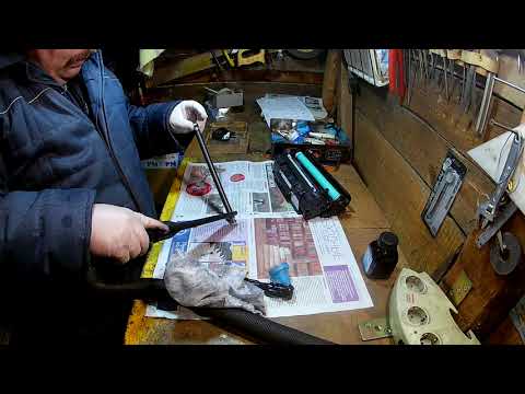 Видео: Заправка фирменного картриджа HP Q5949A