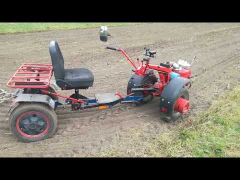 Видео: Мотоблок МТЗ 05, адаптер, борона