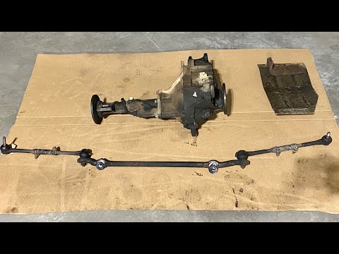 Видео: Снятие переднего дифференциала на Chevrolet OBS 1500 88-98 годов выпуска