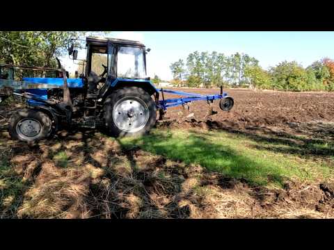 Видео: Винтовой отвал на ПЛН. Пашем целину на мтз 82 плуг 3/35 винтовой отвал.