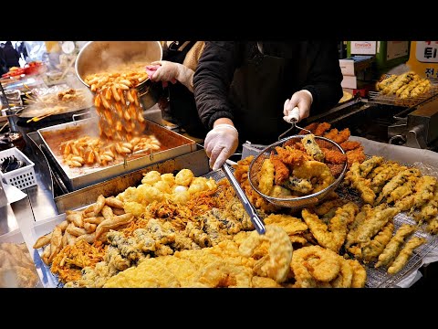 Видео: лучшая уличная еда!! Популярный Токпокки (острый рисовый пирог) - ЛУЧШАЯ 5 / Корейская уличная еда
