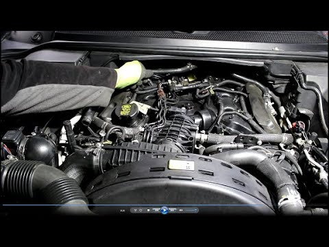 Видео: Замена теплообменника крышки клапанов и свечей накала на Land Rover Discovery 4  3,0  2009 3часть