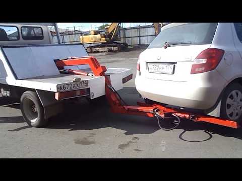 Видео: Работа эвакуатора частичной погрузки