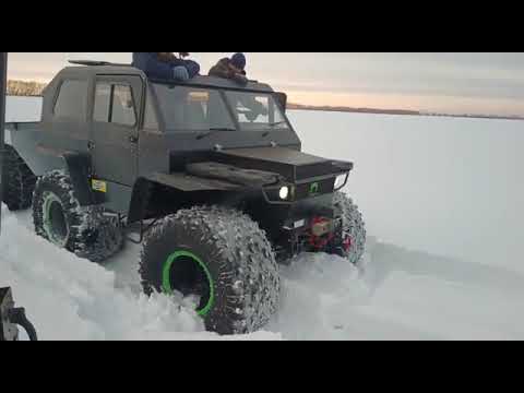 Видео: снегоболотоход Тайпан, по глубокому снегу с прицепом, на шинах авторос.