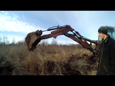 Видео: Засадили экскаватор. Копаем металлолом.