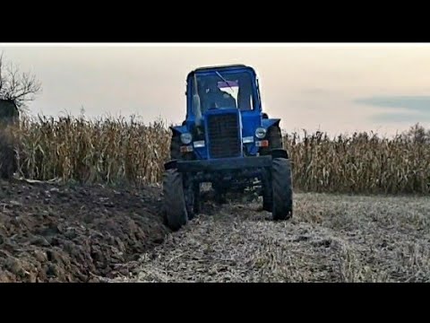 Видео: Оранка МТЗ на зиму після сої плуг ПЛН 3-35 Відвал пластиковий Текрон Tekrone відгук.