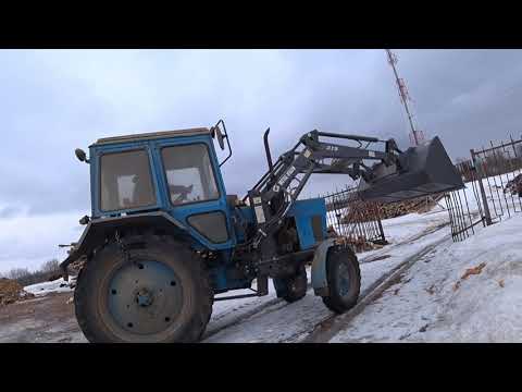 Видео: Работа трактора МТЗ 80 с фронтальным погрузчиком Metal Fach T219  на заготовке дров.