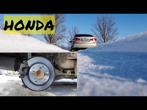 Видео: Замена задних тормозных дисков в паре с колодками Honda civic 8