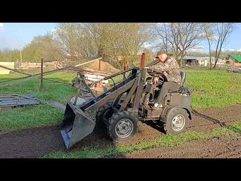 Видео: Мини погрузчик испытания