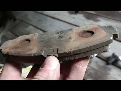 Видео: Замена тормозных колодок, перед, Хонда Одиссей RA 7.