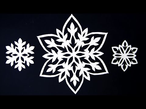 Видео: Как вырезать красивые снежинки из бумаги DIY - Простая снежинка DIY - Простые поделки.