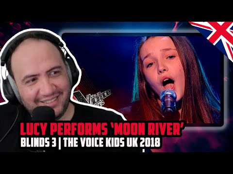 Видео: 🇬🇧 Люси исполняет «Moon River»: Blinds 3 | The Voice Kids UK 2018 | РЕАКЦИЯ УЧИТЕЛЯ ПОЛА