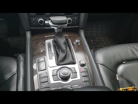 Видео: Разбор консоли MMI и замена рамки AUDI Q7.
